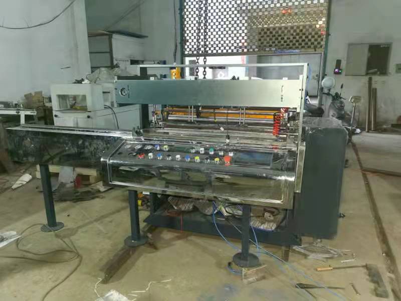 FULLY AUTOMATIC PAPER SERPENTINE STREAMERS SLITTING REWINDING MACHINE